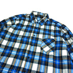 Front view of Blue, Yellow, Black and White Plaid Flannel by Dumbsmart New York